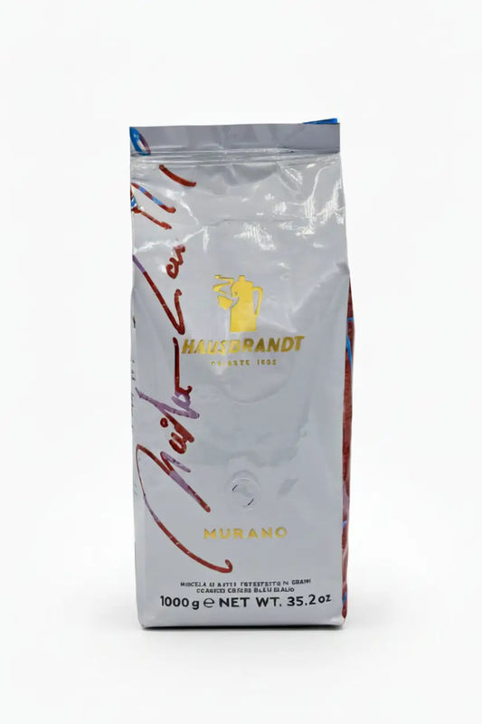 Confezione da 1kg di caffè in grani Hausbrandt Murano su sfondo bianco.